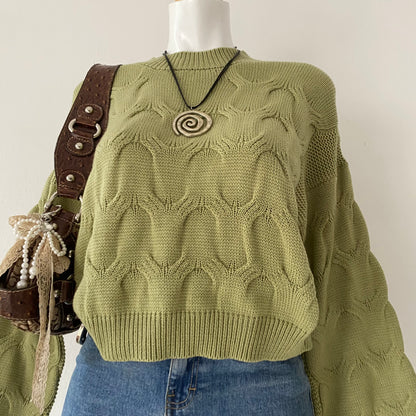 Waist-high sweater with braided design