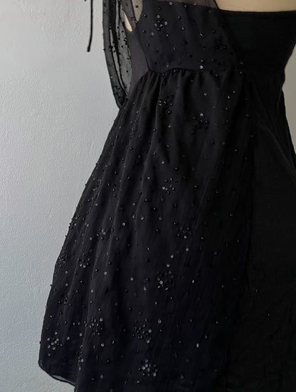 Adorable black top with sequins