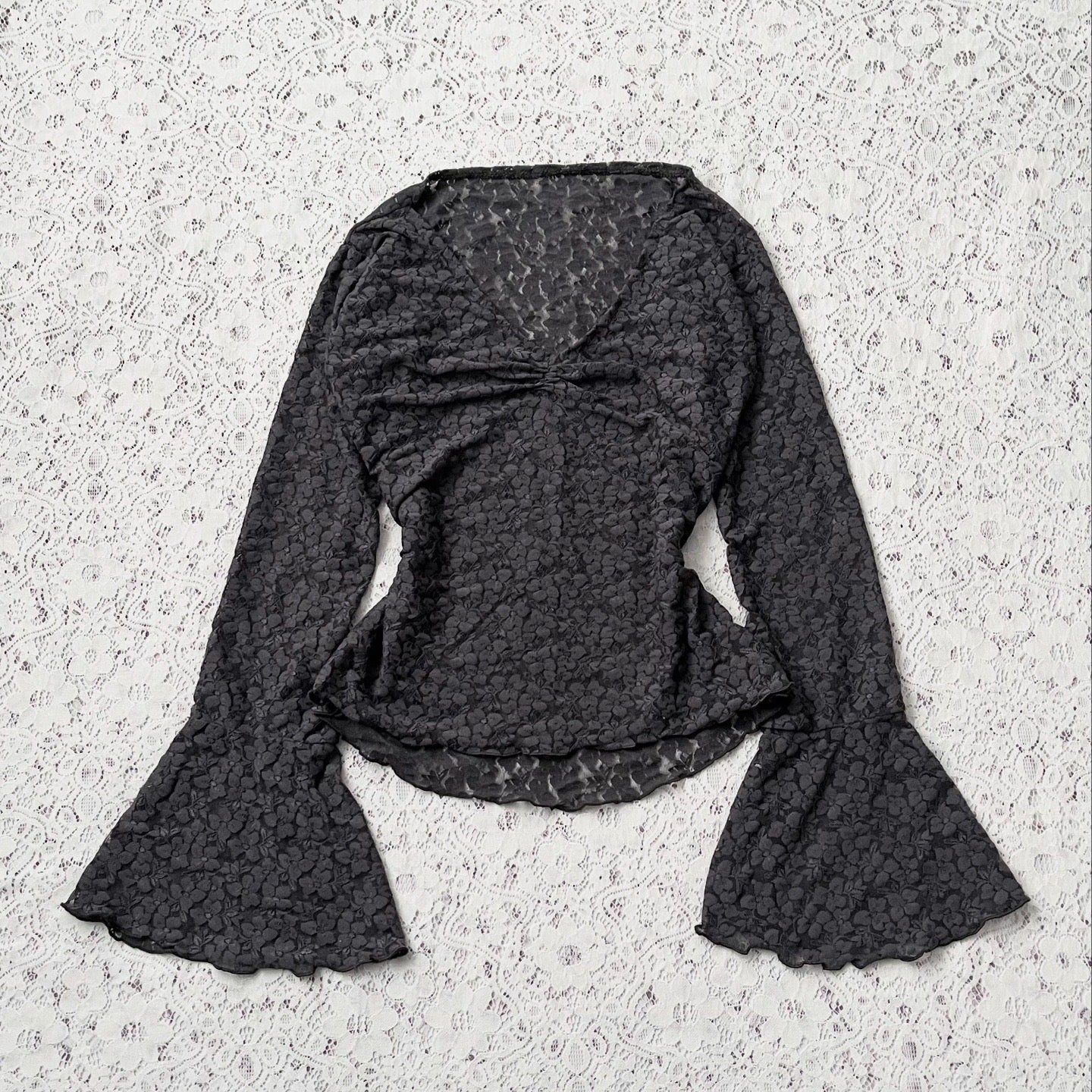 Bell-sleveed lace top