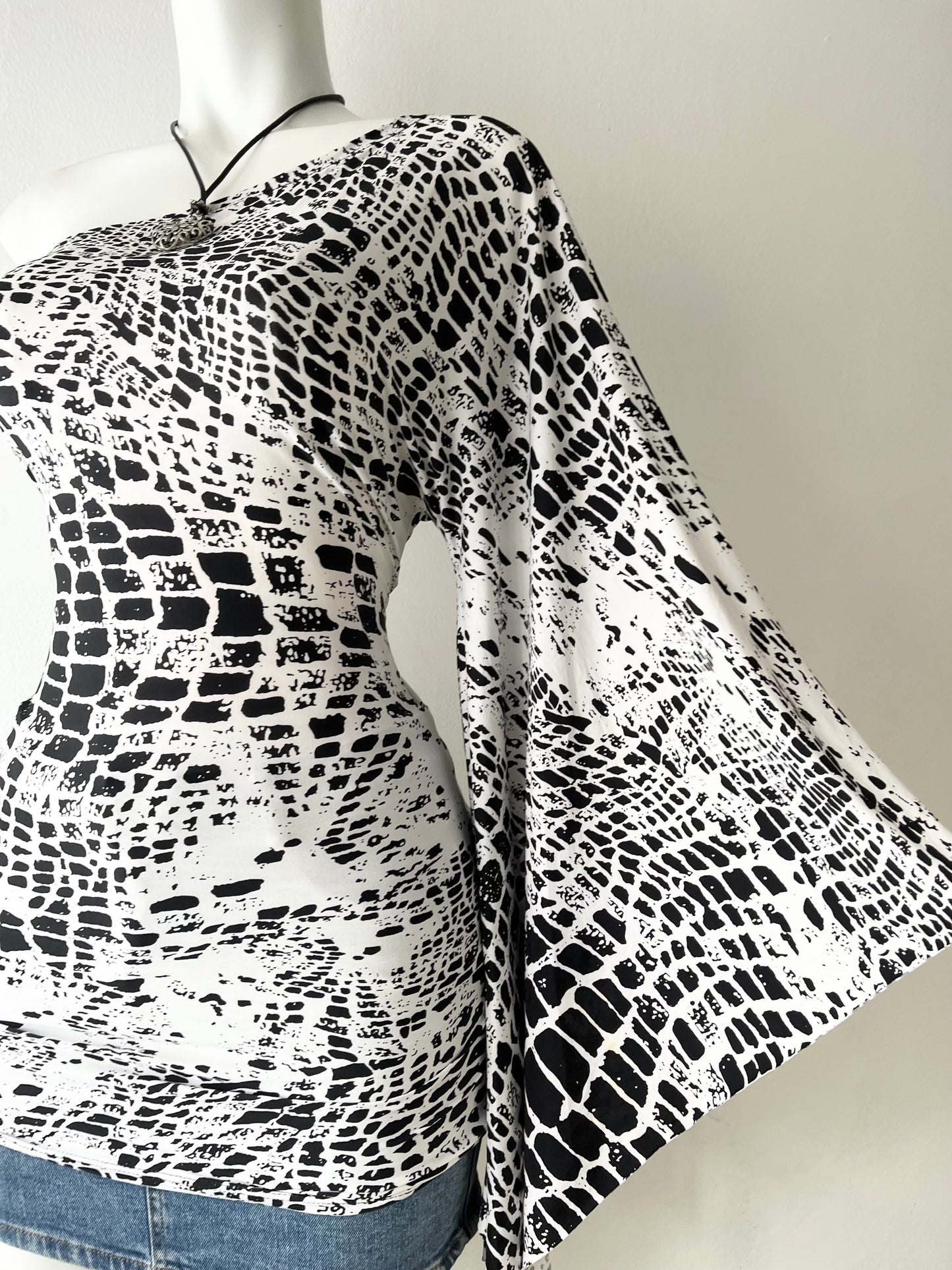 Iconic one-shoulder poly-dress